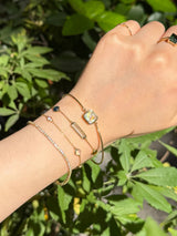 Rainbow Moonstone Supreme Bangle 18k gold Stackable design on model