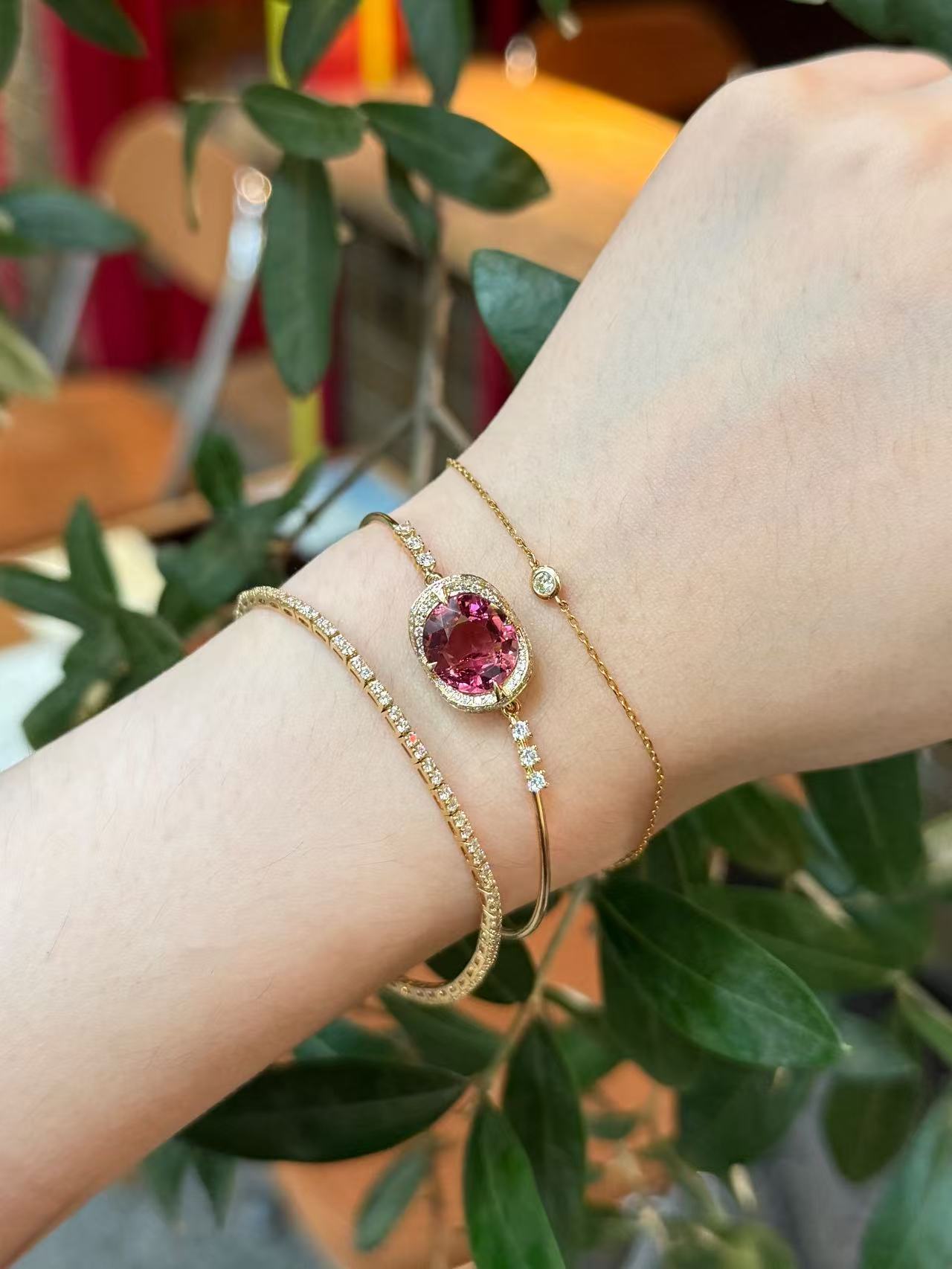 Raspberry Tourmaline Aurora Bangle 18k gold stackable design on model