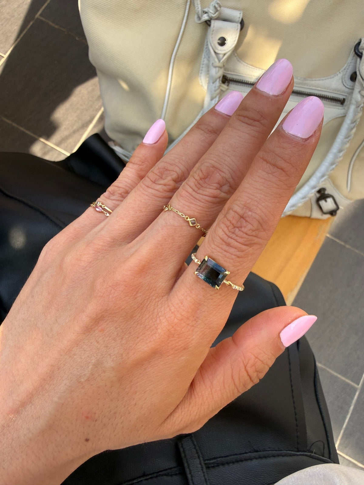 Raven Watermelon Tourmaline Petite Circle Diamond Ring 18K gold stackable ring on model 2
