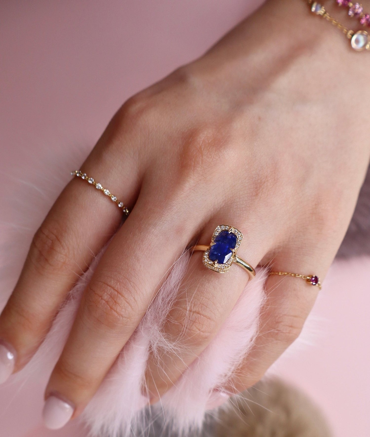 Royal Blue Sapphire Aurora Ring 18k gold engagement ring on model