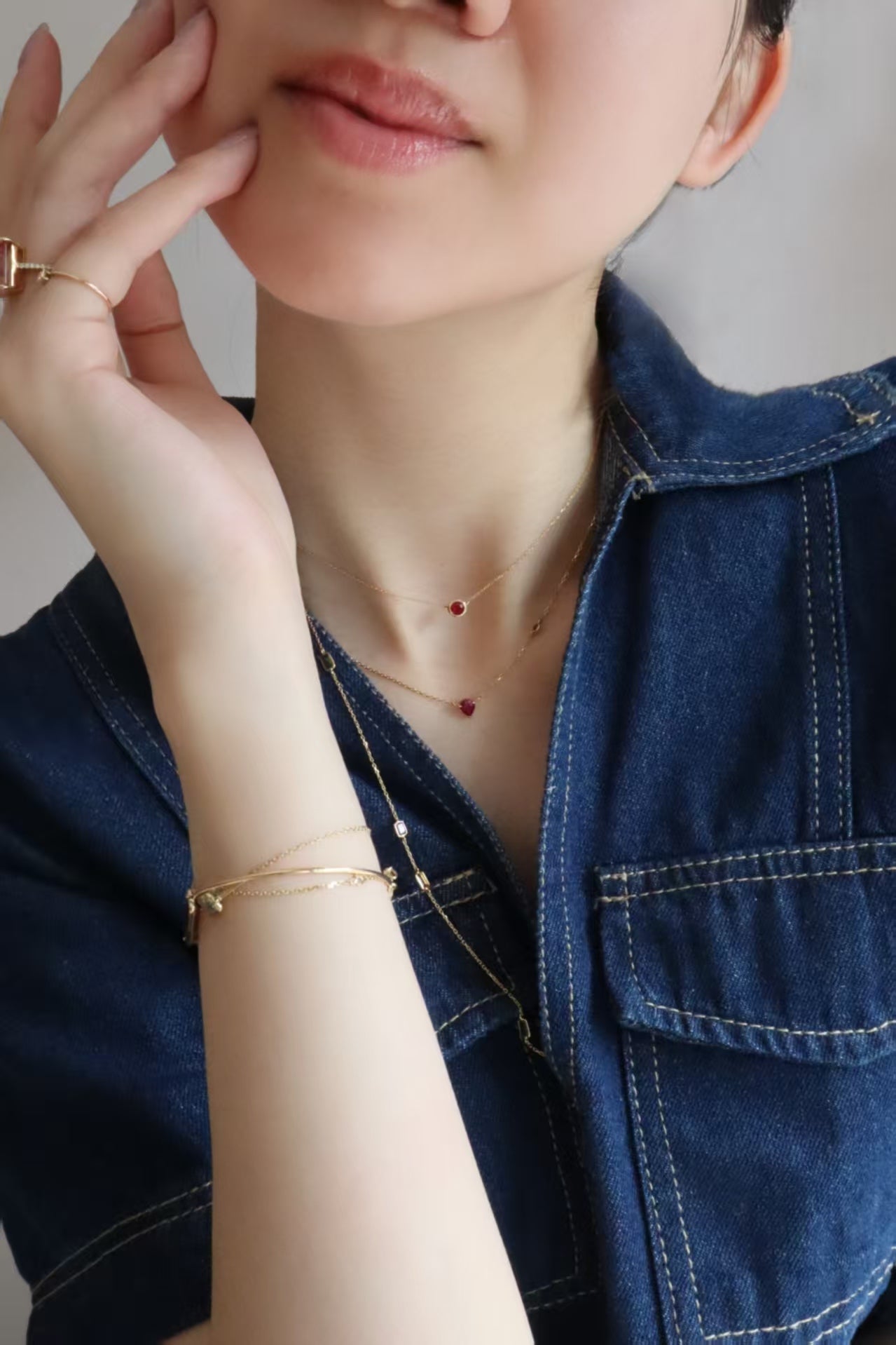Ruby Button Necklace 18K gold handmade fine jewelry on model