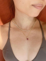 Ruby & Diamond Arrow Necklace 18k gold handmade fine jewelry on model