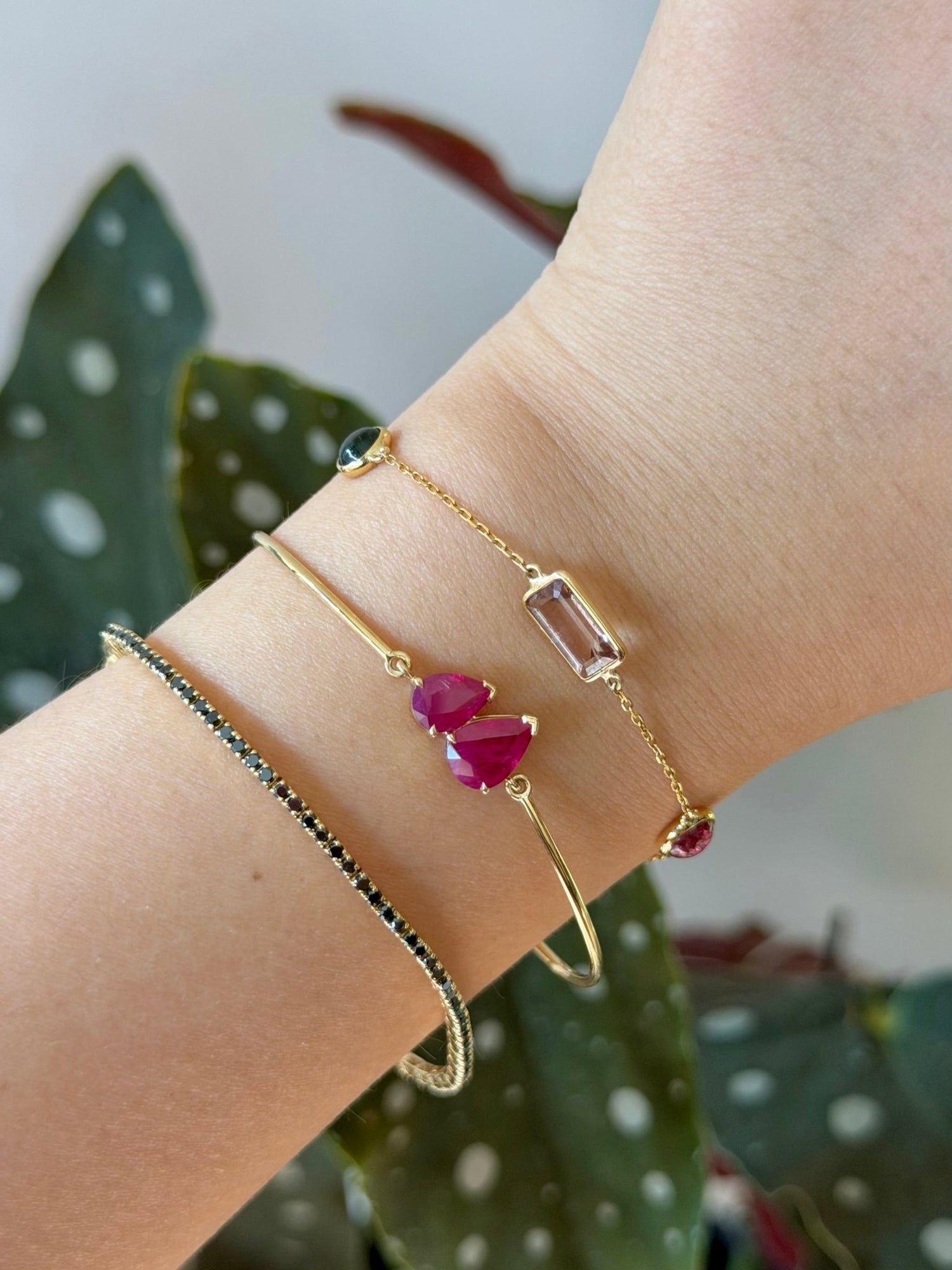Ruby Double Pear Bangle 18k gold stackable design on model