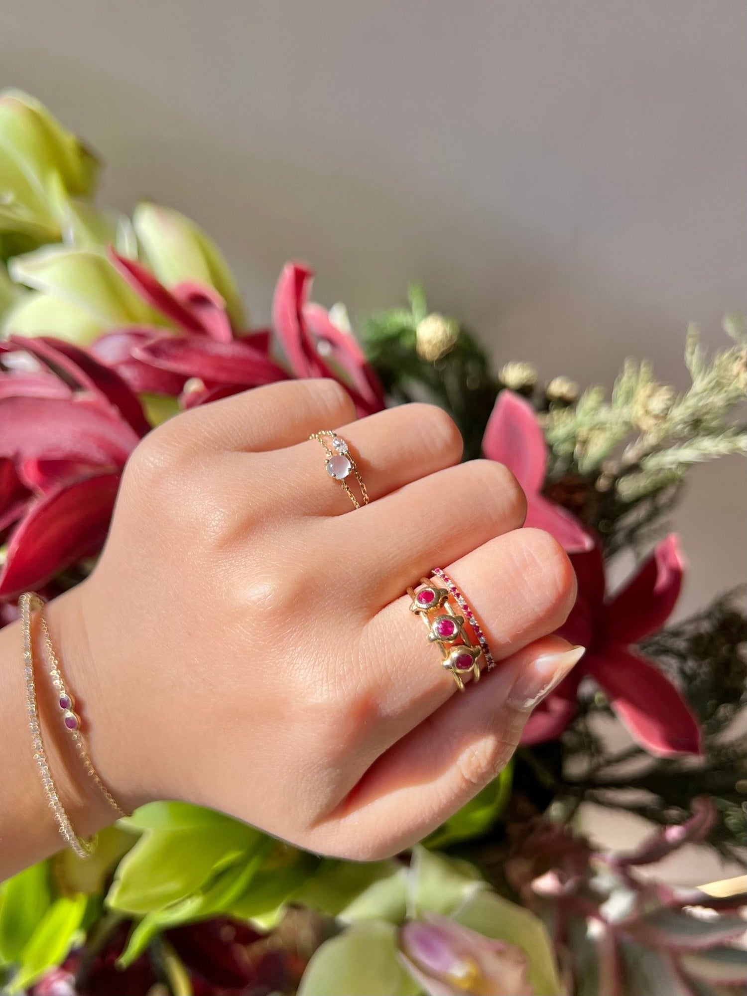 Ruby Orbit Ring 18k gold Stackable ring on model