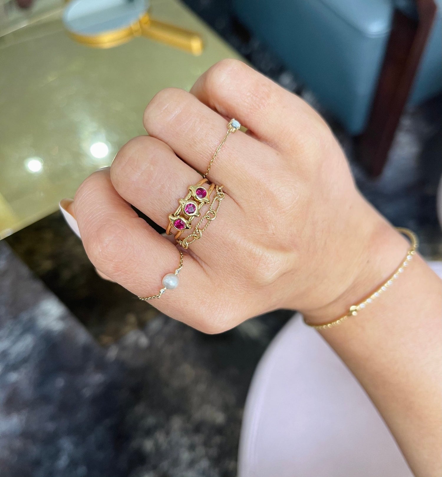 Ruby Orbit Ring 18k gold Stackable ring on model