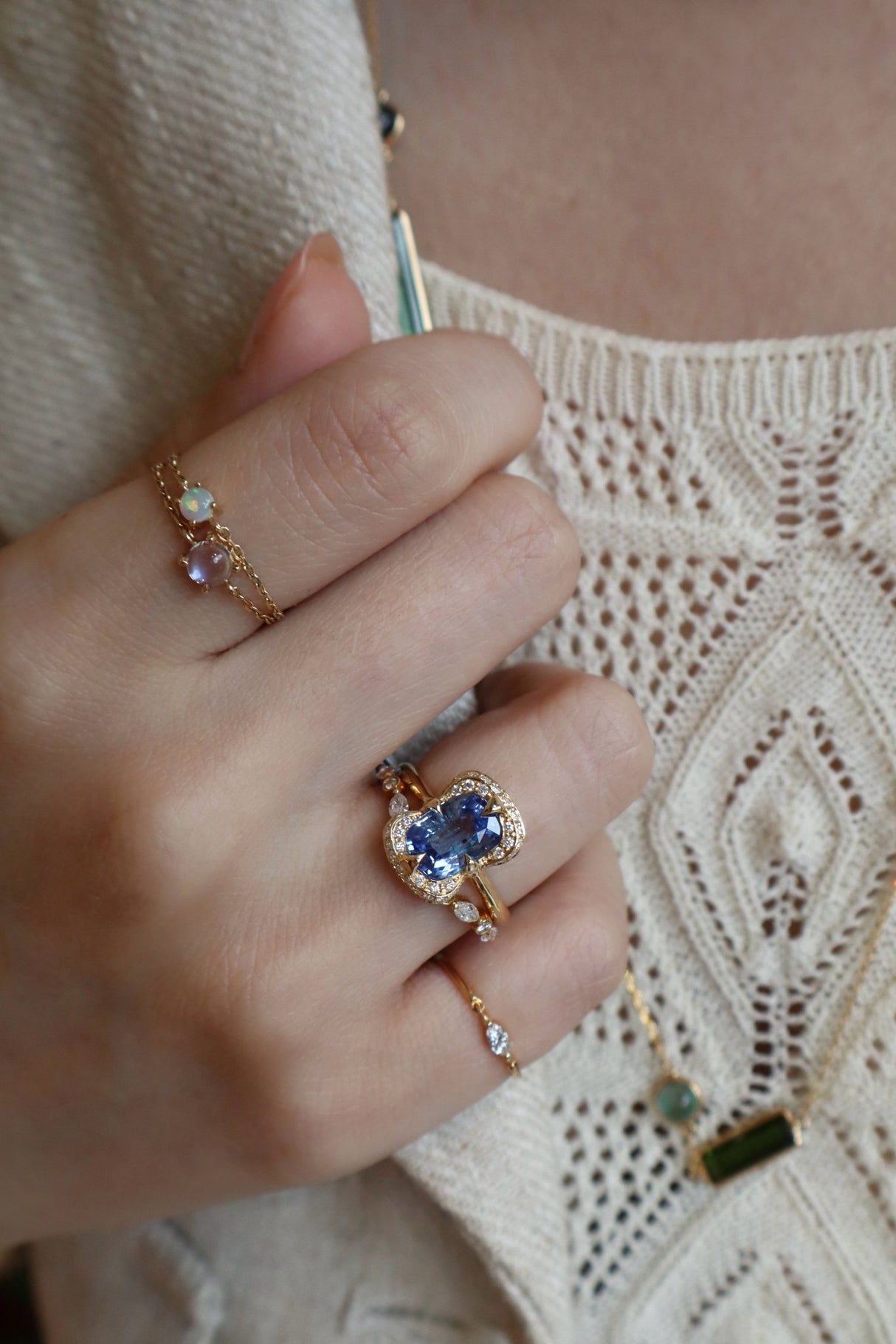 Sapphire Aurora Ring 18k gold engagement ring on hand 1