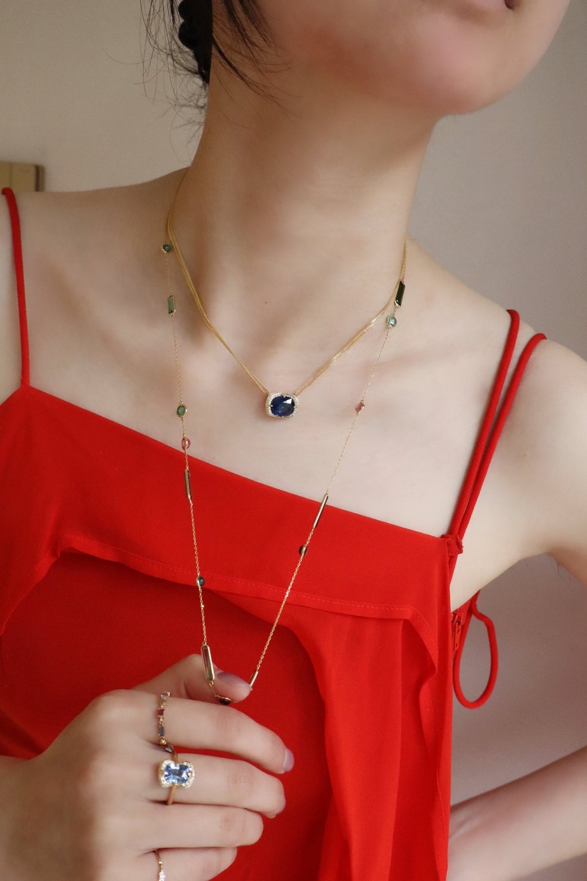 Sapphire Aurora Supreme Necklace 18K gold handmade fine jewelry on model 1