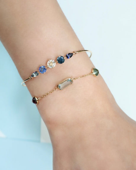 Sapphire_Compass_Bangle_Blue_18K_gold_stackable_design_on_model_1