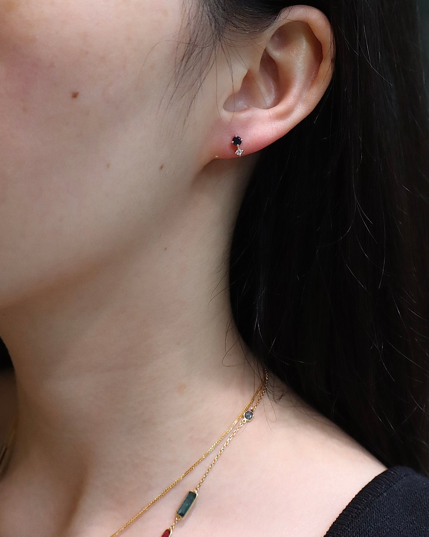 Sapphire_Diamond_Dot_Stud_Pairs_14K_gold_handmade_fine_jewelry_on_model_1