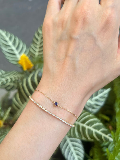 September Birthstone Sapphire Bracelet 14k gold stackable design on model
