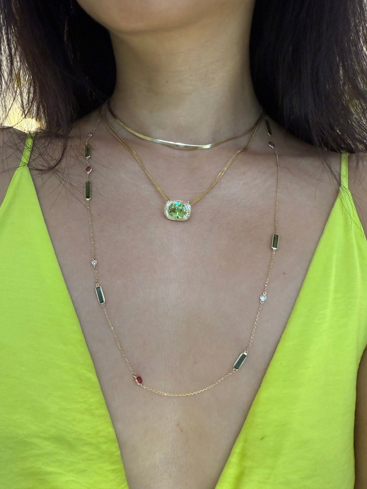 Sphene Aurora Necklace 18k gold handmade fine jewelry on model
