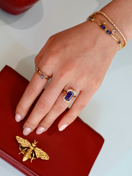 Tanzanite Aurora Ring 18K engagement ring on model