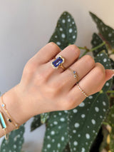 Tanzanite Aurora Ring 18K engagement ring on model 2