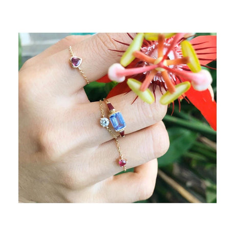 Tanzanite & Ruby Ring 18k gold stackable ring on model