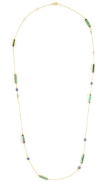 Necklace with green tourmaline sapphire and diamonds on a white background