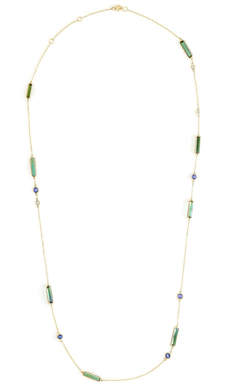Necklace with green tourmaline sapphire and diamonds on a white background