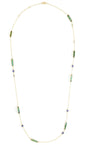 Necklace with green tourmaline sapphire and diamonds on a white background