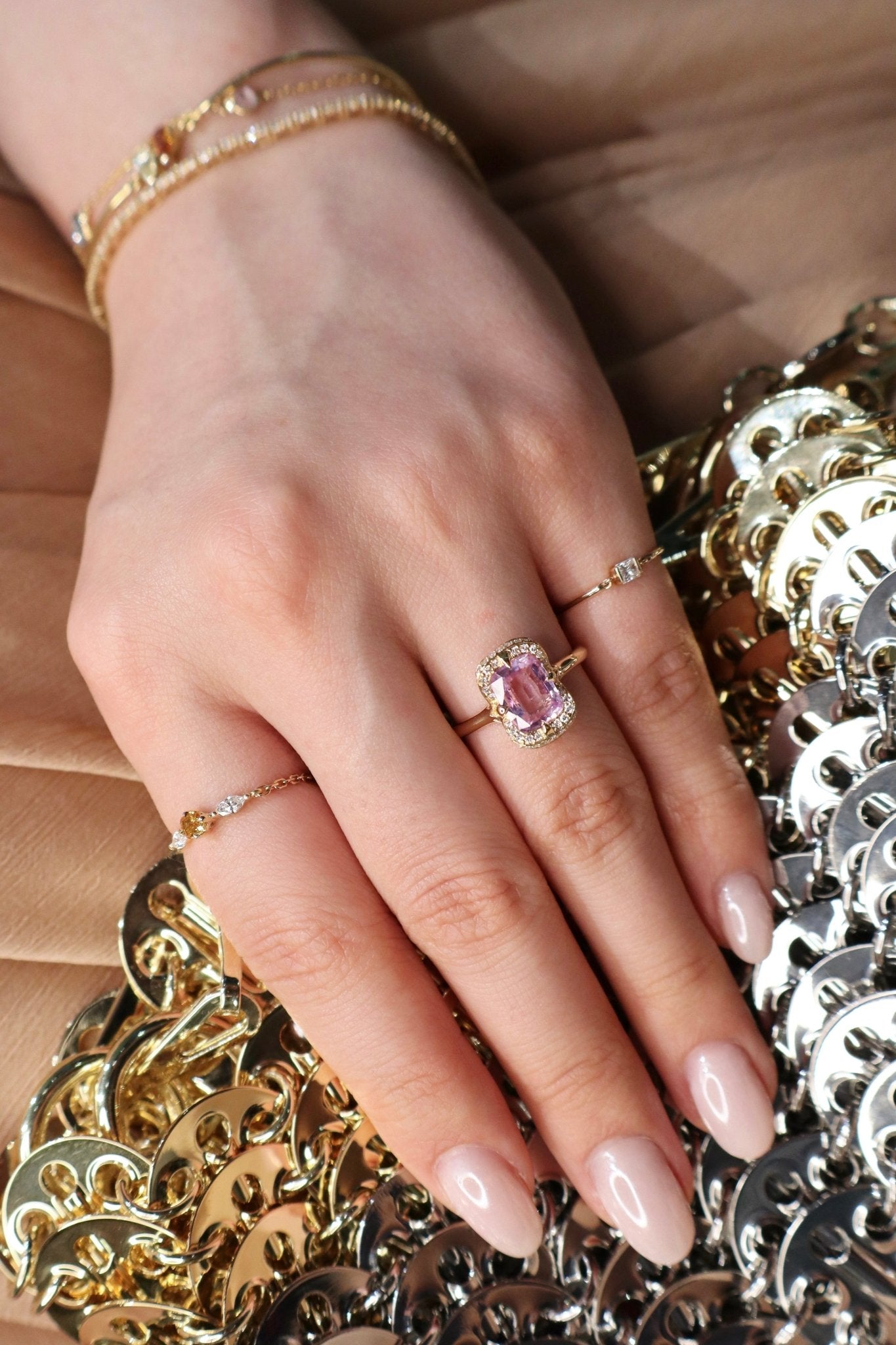 Unheated Pink Sapphire Aurora Ring 18k gold engagement ring on model 3