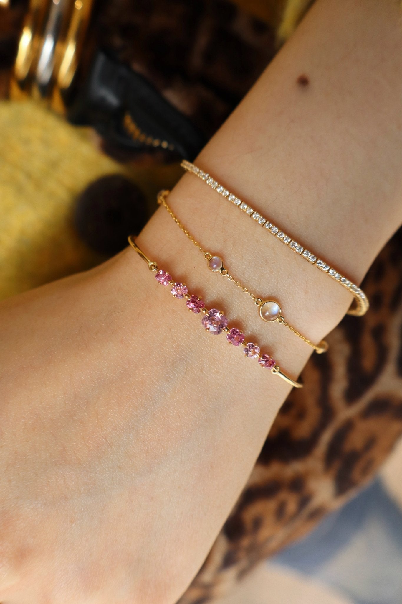 Vivid Pink Spinel Compass Bangle 18k gold stackable design on model