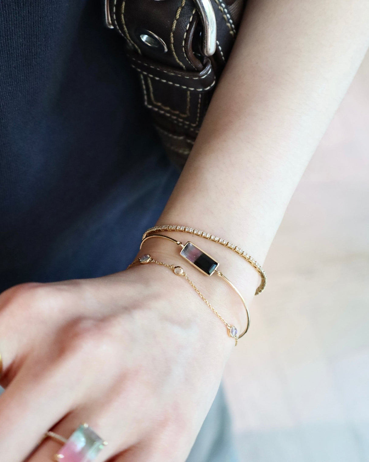 Watermelon Tourmaline Protection Bangle 18k gold Stackable design on model