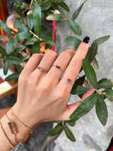 Watermelon Tourmaline petite Circle Diamond Ring 14k gold Stackable ring on hand.