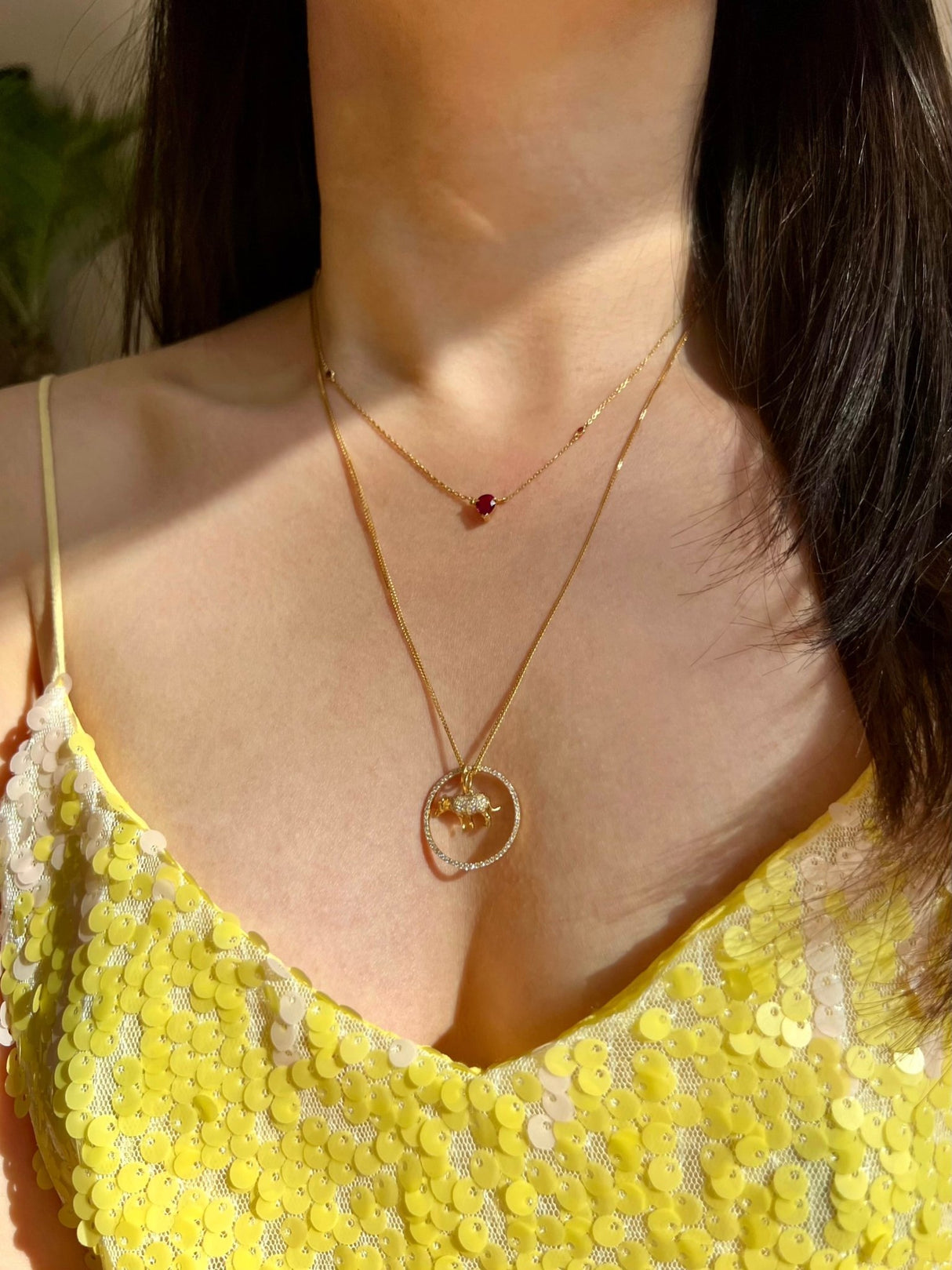 Zodiac Ox Pendant Necklace on model 2