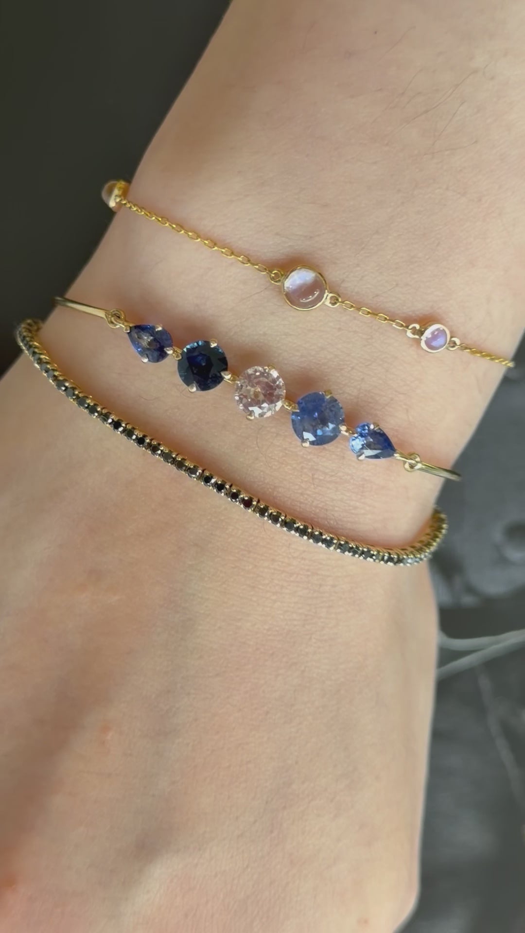Sapphire Compass Bangle 18K gold stackable design on model 