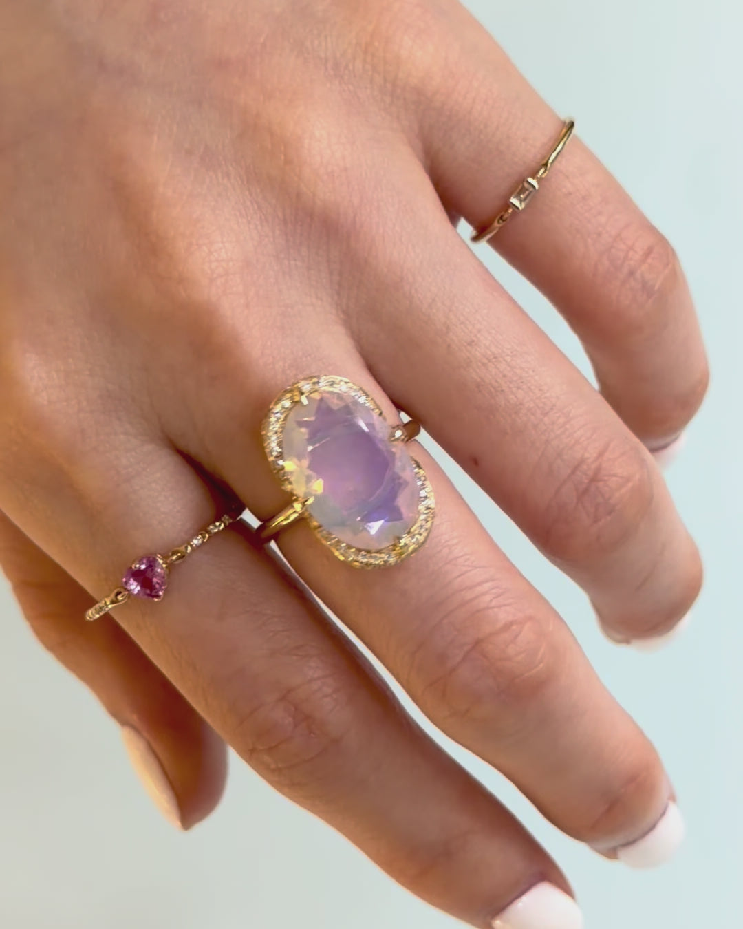 Jelly_Opal_Aurora_Ring_18K_gold_engagement_ring_on_model_video