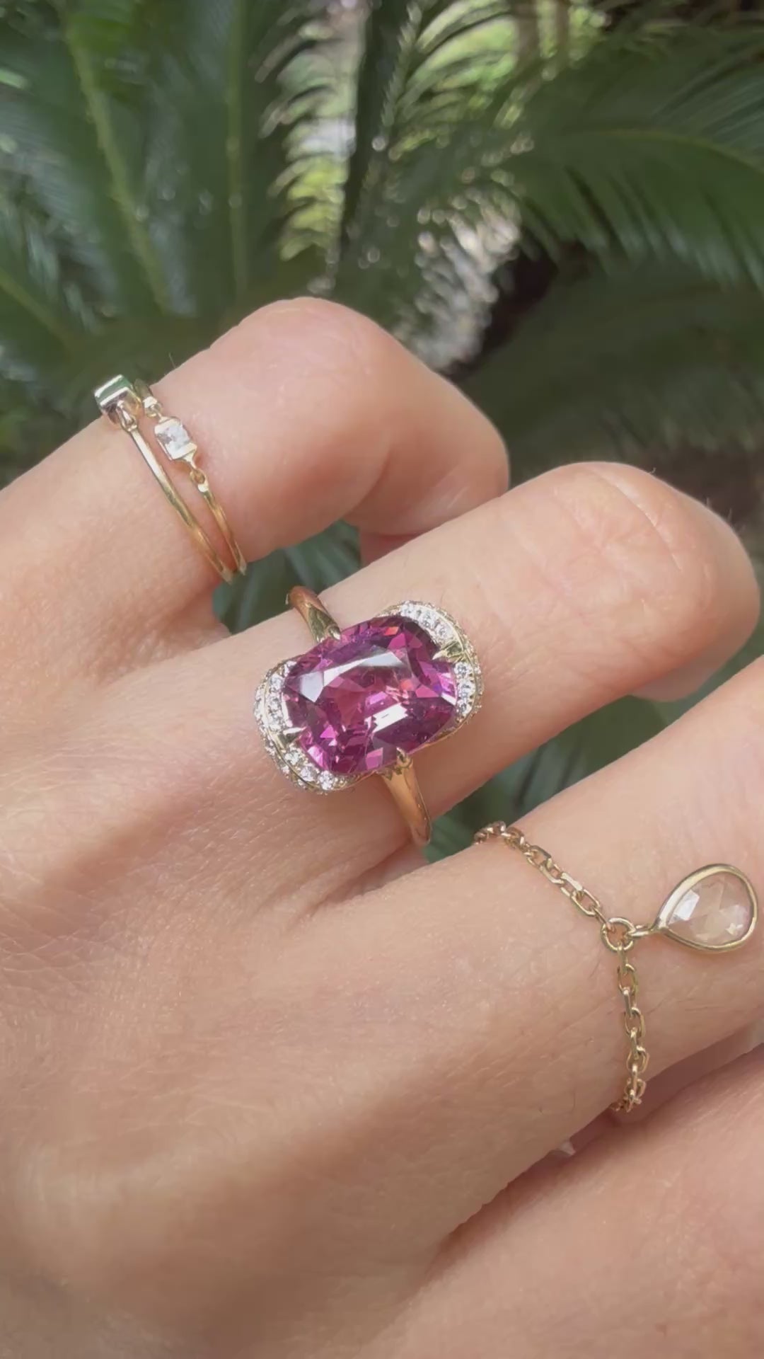 Mahenge Garnet Aurora Ring 18k gold engagement ring on model