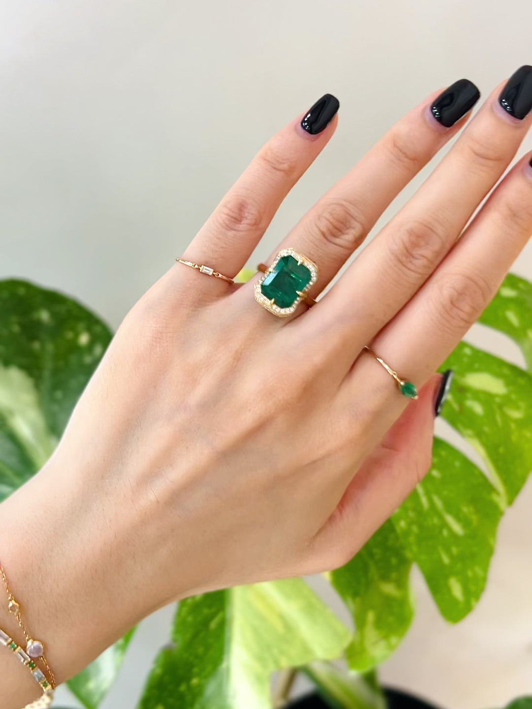 Emerald & Diamond Aurora Supreme Ring 18k gold engagement ring on model