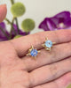 Ceylon_Sapphire_Starburst_earrings_18K_gold_handmade_fine_jewelry_on_model_video