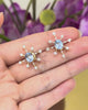 Baby_Blue_Sapphire_Diamond_Starburst_Earrings_18K_gold_handmade_fine_jewelry_on_model_video