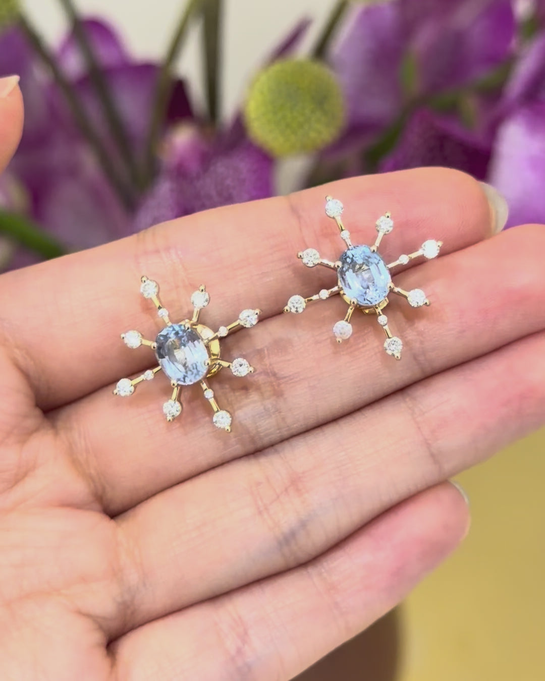 Baby_Blue_Sapphire_Diamond_Starburst_Earrings_18K_gold_handmade_fine_jewelry_on_model_video