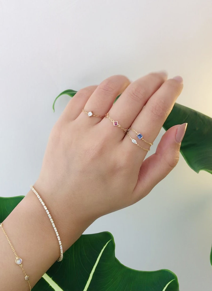 Baby blue sapphire chain ring