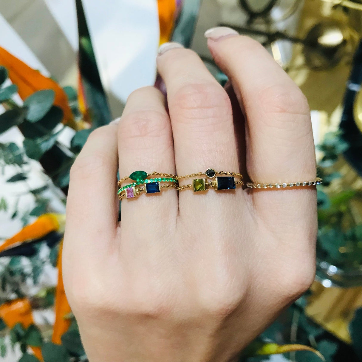 Emerald Infinity Ring 18k gold stackable ring on model 2