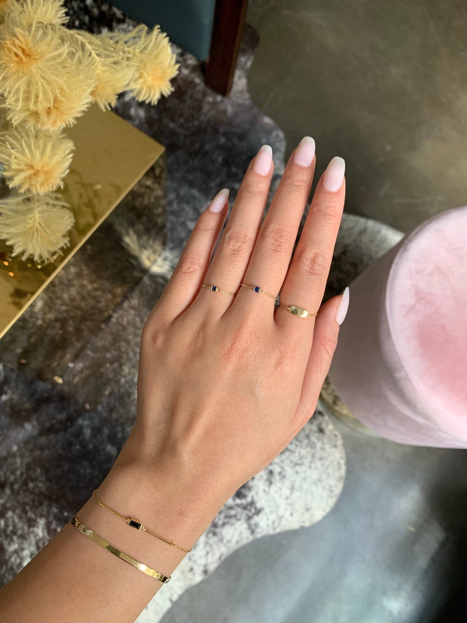 Sapphire Petite Chain Ring 14k gold Stackable ring on model 