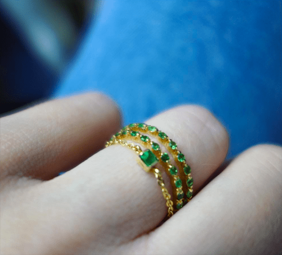 Tsavorite Infinity Ring 18k gold stackable ring on model